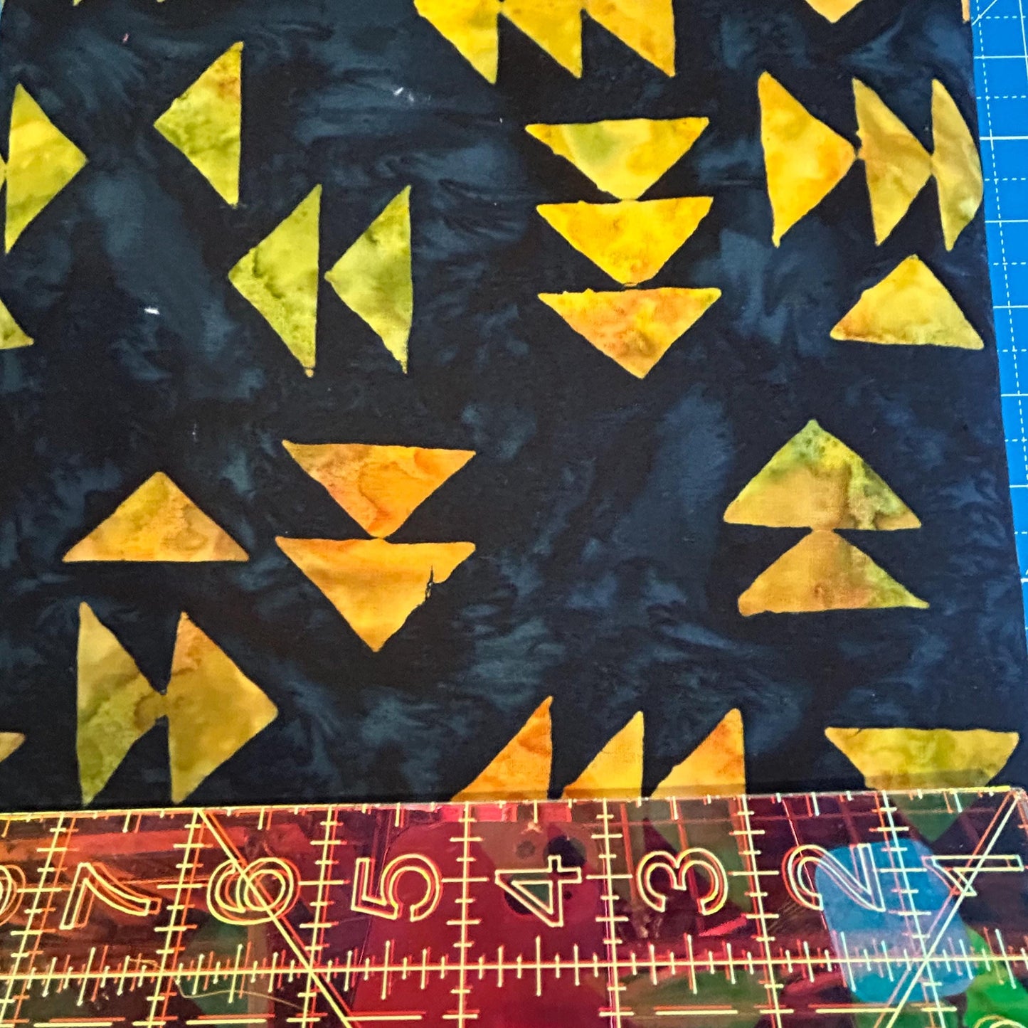 Batik Textiles - Black batik fabric with orange geometric designs - Fabric by the half yard